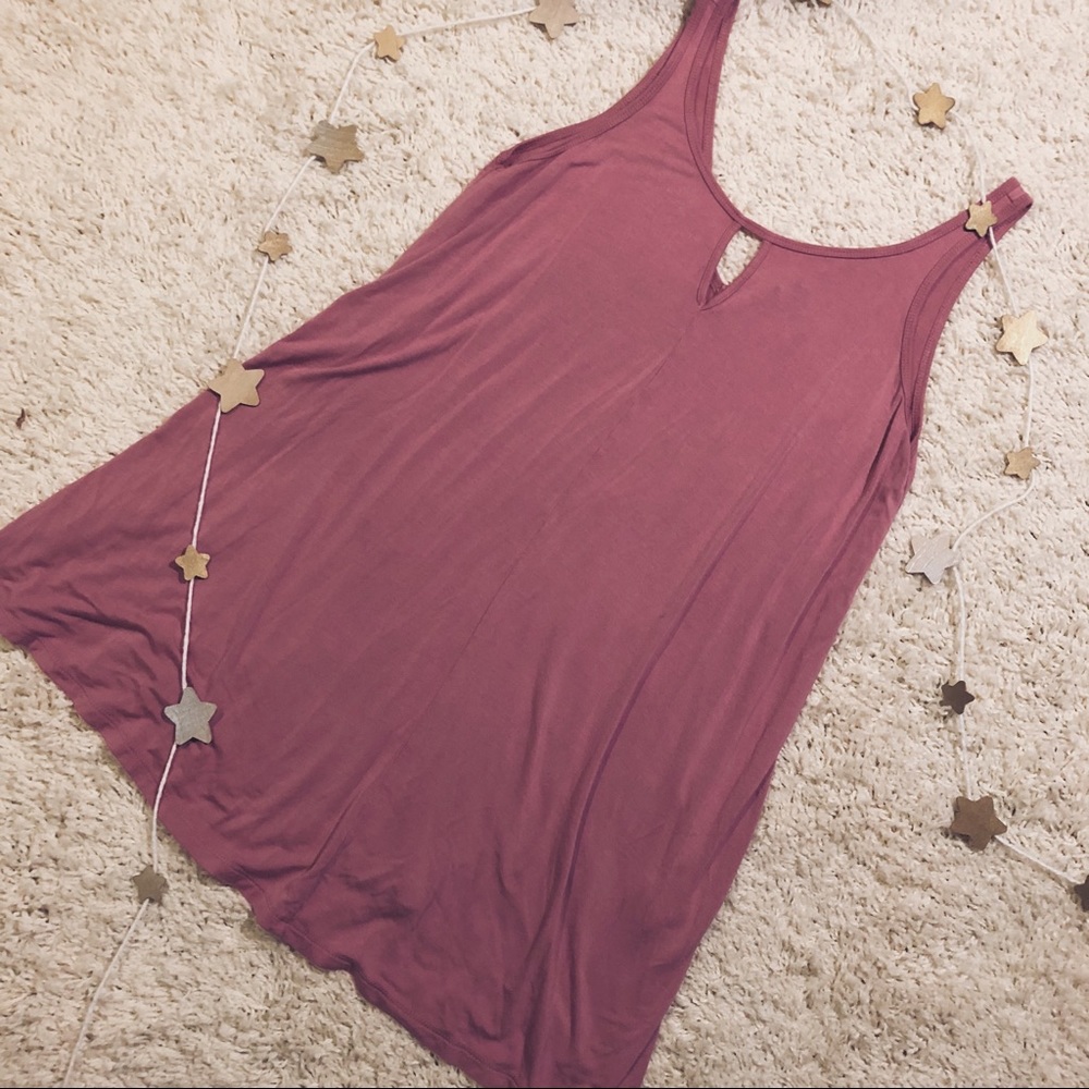 long pink shirt with cutout